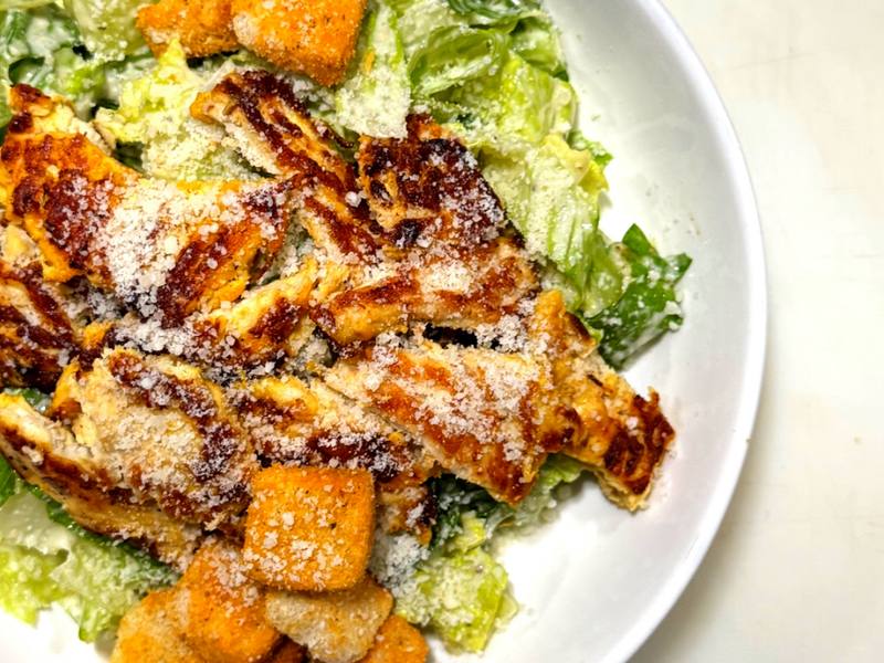 Chicken Caesar salad with grilled chicken, parmesan and croutons